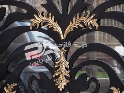 عکس شماره 19063 مدل-034-درب-فلزی-پایون-با-فرفورژه-از-نمای-نزدیک