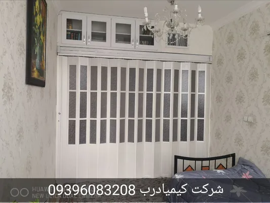 عکس درب آکاردئونی پی وی سی پنجره دار  21969